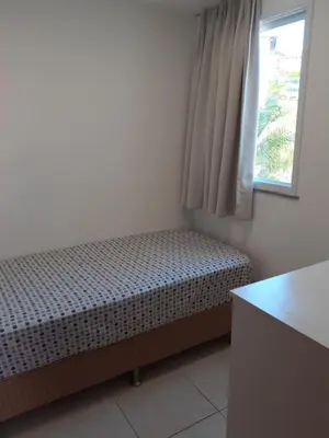 Uma cama ou camas num quarto em Apartamento Porto Beach Residence