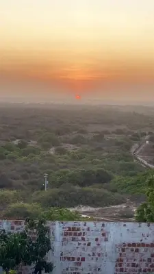 O nascer ou o pôr do sol visto a partir do quarto em acomodação particular