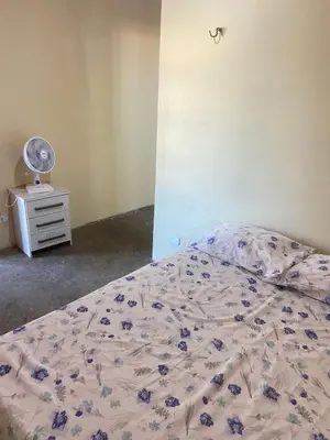 Uma cama ou camas num quarto em Casa do Charlles