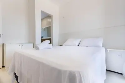 Uma cama ou camas num quarto em Beach Townhouses #C13 - Apartamento por Carpediem