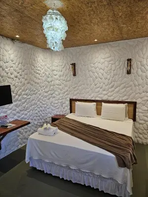 Uma cama ou camas num quarto em Kanto do Chico
