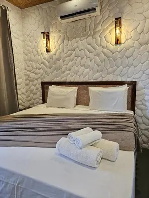 Uma cama ou camas num quarto em Kanto do Chico