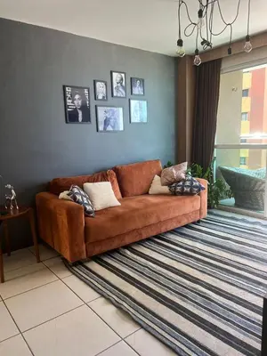Uma área de estar em Apto à Beira Mar - Terraços do Atlântico