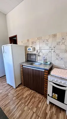 A cozinha ou kitchenette de Suítes Green Village Flecheiras