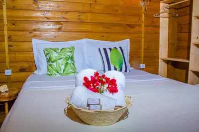 Uma cama ou camas num quarto em Chalet Paraiso Canoa na praia - Canoa Quebrada