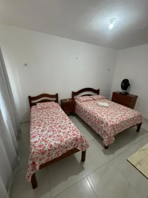 Uma cama ou camas num quarto em Casa Tropicana (2º andar)