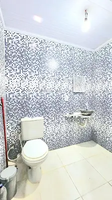 Uma casa de banho em Chalé Verdelândia Guaramiranga - Casa com piscina na Serra