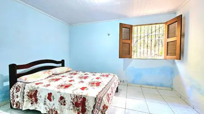 Uma cama ou camas num quarto em Chalé Verdelândia Guaramiranga - Casa com piscina na Serra