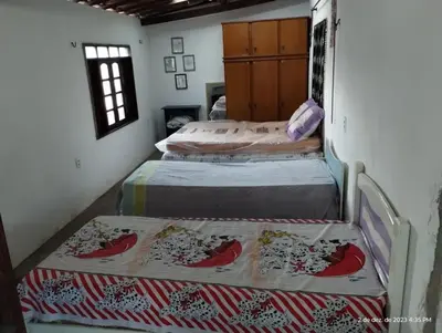 Uma cama ou camas num quarto em Aconchego do bens
