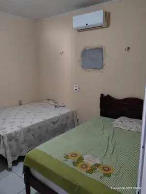 Uma cama ou camas num quarto em Aconchego do bens