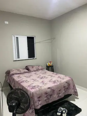 Uma cama ou camas num quarto em Casa de férias mg