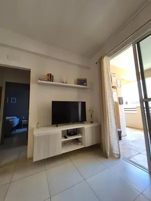 Uma televisão e/ou sistema de entretenimento em Cumbuco Residence #203