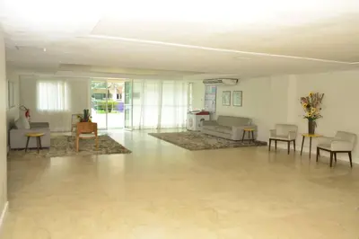 Uma área de estar em VG Fun Praia do Futuro apto 213