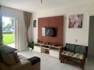 Uma televisão e/ou sistema de entretenimento em Apt no Icaraí mobiliado de frente para a praia.