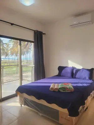 Uma cama ou camas num quarto em FLECHEIRAS ATLANTICO