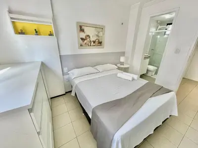 Uma cama ou camas num quarto em Alessandra Residence | Meireles - CE