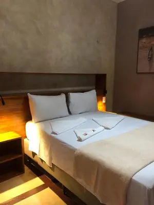Uma cama ou camas num quarto em Pousada Casa do Bruno