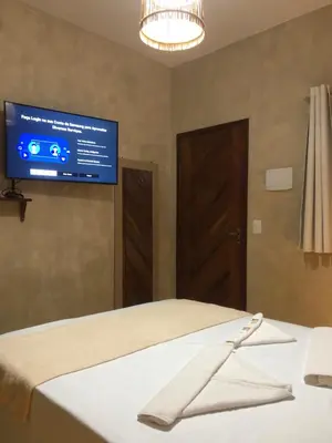 Uma cama ou camas num quarto em Pousada Casa do Bruno