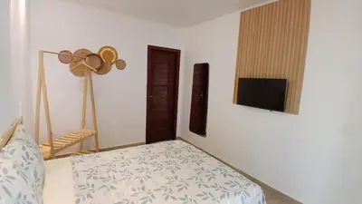 Uma cama ou camas num quarto em Pousada Solarium