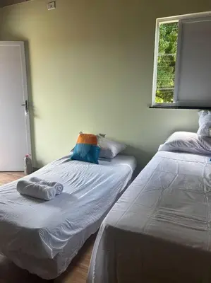 Uma cama ou camas num quarto em Apartamento 200m da lagoa