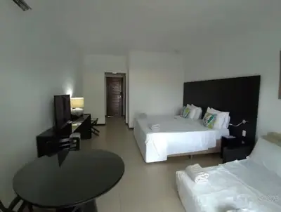 Uma cama ou camas num quarto em Dom Pedro Laguna Beach Resort & Golf