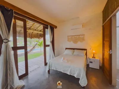 Uma cama ou camas num quarto em Moitas chalés