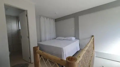Uma cama ou camas num quarto em VidaBela Lofts Cumbuco CE