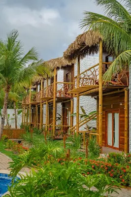 Um jardim no exterior de Villa Jaguar Fortim