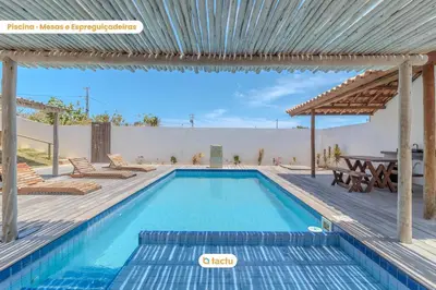 A piscina em ou perto de Apto térreo no Pontal do Maceió Tactu