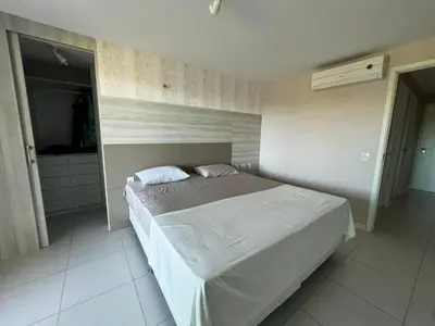 Uma cama ou camas num quarto em Apartamento GolfVille Residence