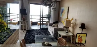 Uma área de estar em Iate Plaza, Flat na areia em Meireles
