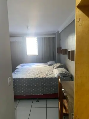 Uma cama ou camas num quarto em Apartamento Porto de Iracema