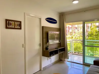 Uma televisão e/ou sistema de entretenimento em VG Fun Fortaleza - Apartamento de Temporada na Praia do Futuro