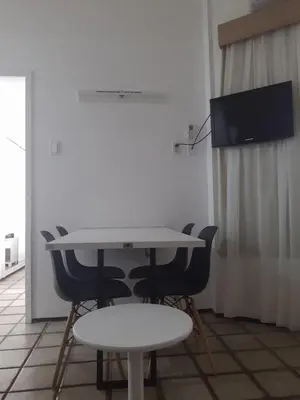 Uma televisão e/ou sistema de entretenimento em Flat Golden Fortaleza