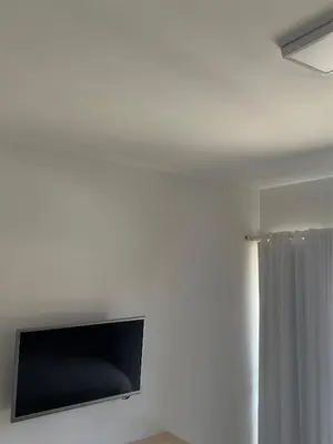 Uma televisão e/ou sistema de entretenimento em Eco Paradise Apto 214
