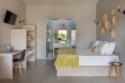 Uma cama ou camas num quarto em Vila Flor Studios