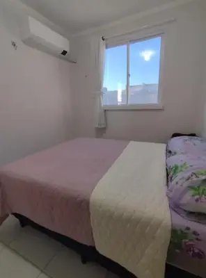 Uma cama ou camas num quarto em Refúgio tranquilo em bairro aconchegante