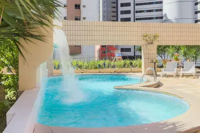 A piscina em ou perto de Espaçoso 2 rooms, ampla varanda perto do mar
