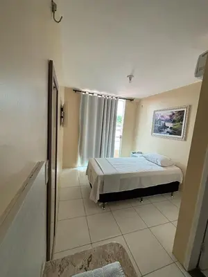 Uma cama ou camas num quarto em Várzea HOTEL