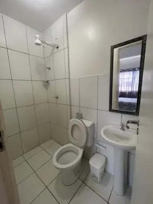 Uma casa de banho em Apartamento Familia LL