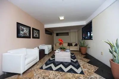 Uma televisão e/ou sistema de entretenimento em Apartamento Perto da BEIRA MAR.