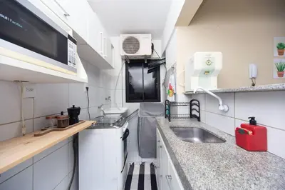 A cozinha ou kitchenette de Apartamento Perto da BEIRA MAR.