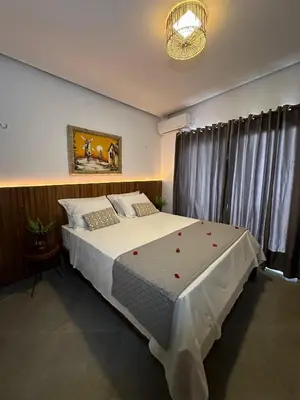 Uma cama ou camas num quarto em Casa ANNA JERI