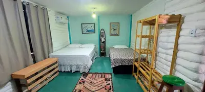 Uma cama ou camas num quarto em Portal Vida chalé na praia da Taiba