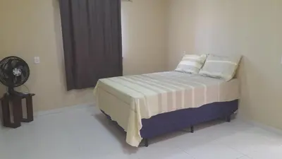 Uma cama ou camas num quarto em Espaço Analu