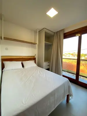 Uma cama ou camas num quarto em Villa Palmeira Flecheiras 201