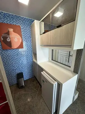 A cozinha ou kitchenette de Lindo Flat beira-mar