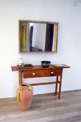 Uma televisão e/ou sistema de entretenimento em Hospedaria Villa Água de Côco Jericoacoara