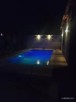 A piscina em ou perto de Chalé dos Coqueiros em Paracuru
