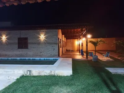 A piscina em ou perto de Chalé dos Coqueiros em Paracuru